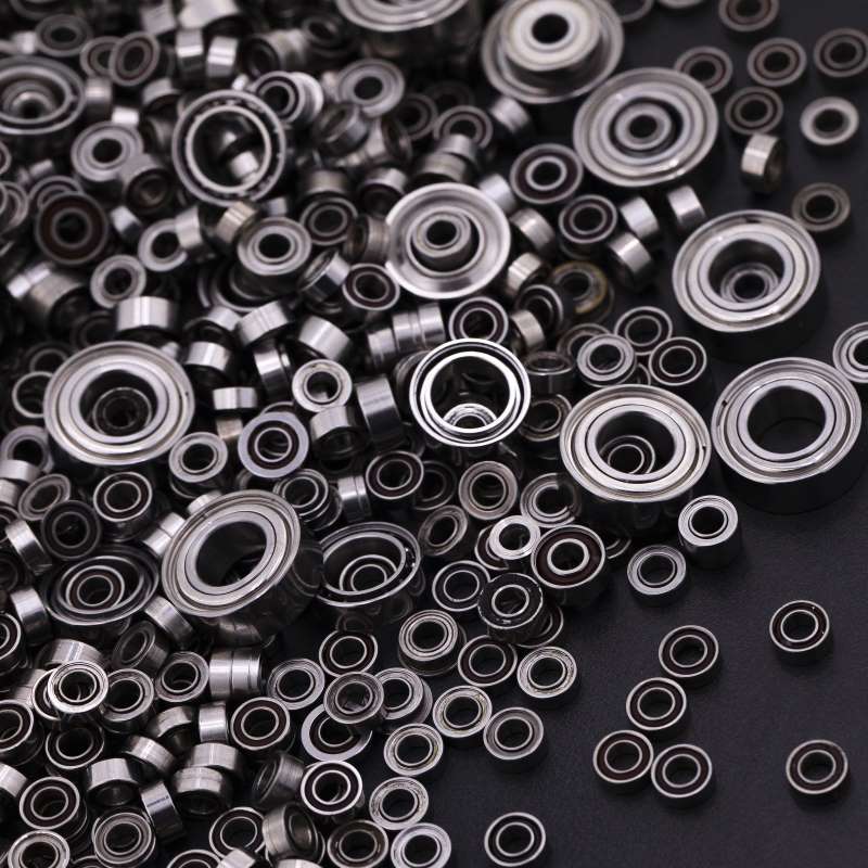a pile of high speed ball bearings in different sizes